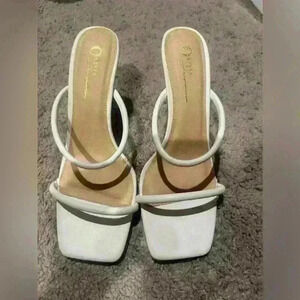 White 2-inch heels.